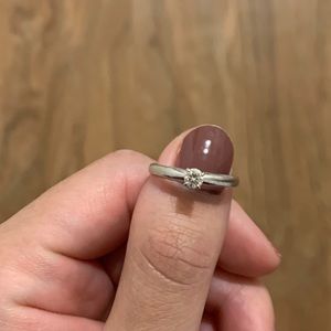 0.25 carat ring with 14 k white gold band